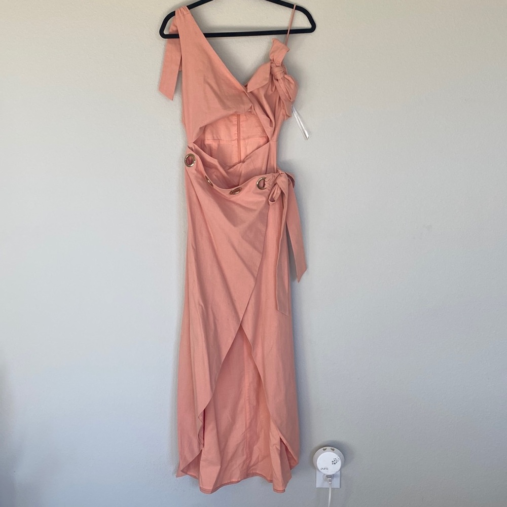 Linen burnt orange dress with a cut out midsection